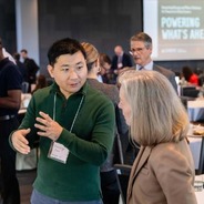 Audience members discuss the issues